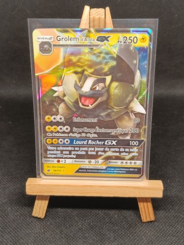 Carte pokémon grolem - pokémon, d'alola