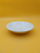 Assiette percée égoutoir