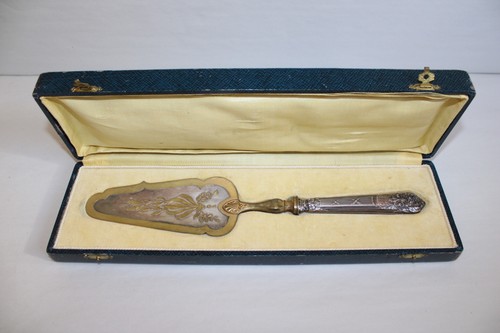 Pelle tarte manche argent - à,