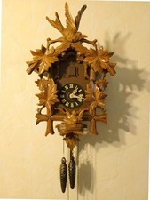 Horloge Coucou Sculptée