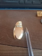 Broche Givenchy Amarige