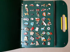 classeur 135 pin's divers thèmes