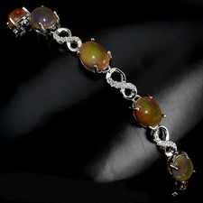 Beau Bracelet en argent massif, vrais  solide Opale Ethiopia de Feu et Zircons