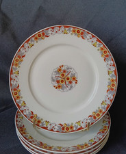 4 assiettes à dessert en porcelaine de Limoges Art Déco