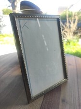 Cadre photo vintage à poser métal doré et finement décoré sur tous les pourtours