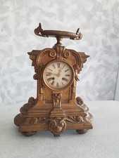 Ancienne pendule de cheminée ( en fonte )