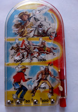 Vintage mini flipper de poche . Ancien jouet de bazar. Western . Années 70