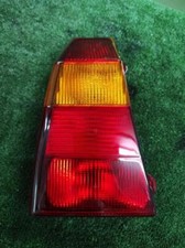 103F07072721 Enjoliveur Inf Feu Arriere Gauche pour CITROEN AX * 312389