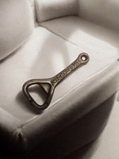 Décapsuleur publicitaire vintage ancien, objet rétro pour collectionneur