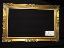 Grand cadre en bois doré