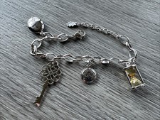 Superbe Bracelet Breloques - Créatrice Inès de la Fressange