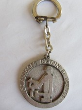Porte clef métal "LES ALLIAGES D'ETAIN ET DERIVES - PARIS X" vintage - années 60