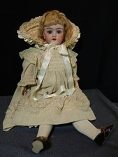 Poupée ancienne tête en