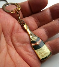 Ancien porte clé bouteille