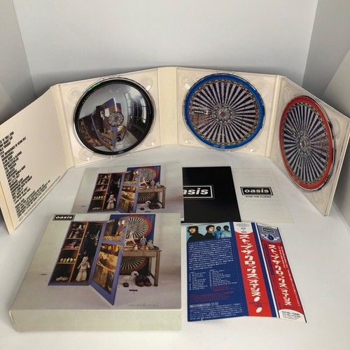 Oasis stop the clocks - –,