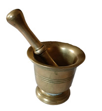 Pilon et mortier antiques en