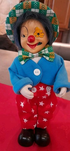 Clown musical tete mains et - tete,,