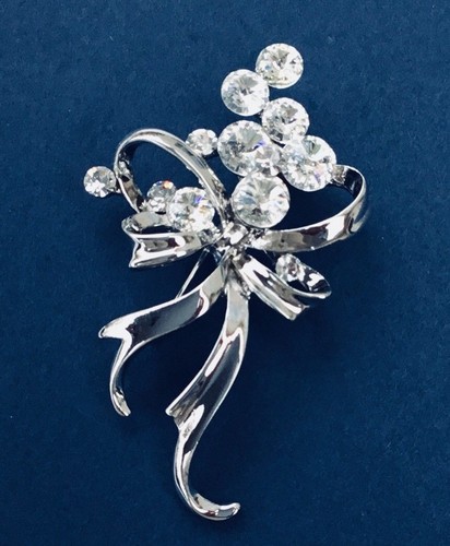 Sparkly silver tone flower