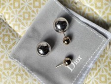 DIOR   Boucles d'oreilles Dior  Tribales  argentées et dorées