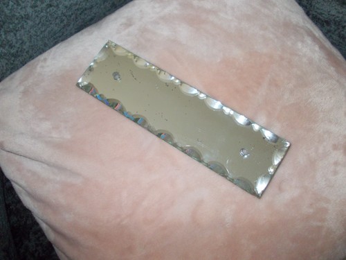 Une plaque propreté miroir - de,