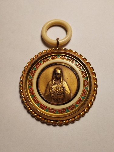 Ancienne médaille berceau - de,