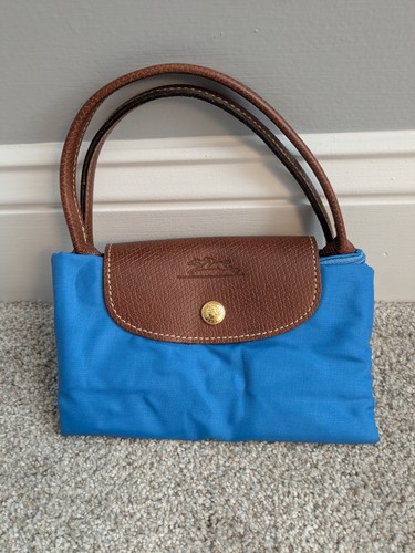 Longchamp - longchamp, le