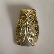 Broche cigale en métal doré