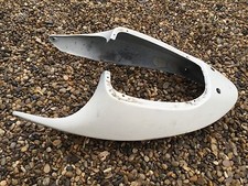 UNE COQUE CACHE CARENAGE