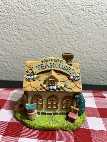 Hello kitty tea house coin - kitty,