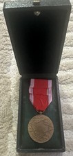 Médaille société - de, la