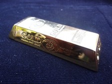 briquet ancien   . lingot d or .