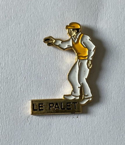Pin joueur de - de, palet