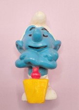 20043 FAULENZER - SCHLEICH / SCHTROUMPF / SCHTROUMPFS / SCHTROUMPFS Bêche Rouge