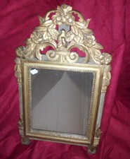 Miroir bois doré décor d'oiseaux XX siècle