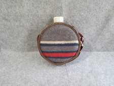 gourde en fer blanc et