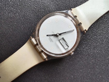 Montre Swatch vintage modèle 1999 - boîtier acrylique translucide-guichet dateur