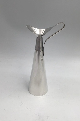 Vase pichet pour - pour, orchidée