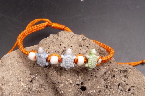 Bracelet macramé orange avec