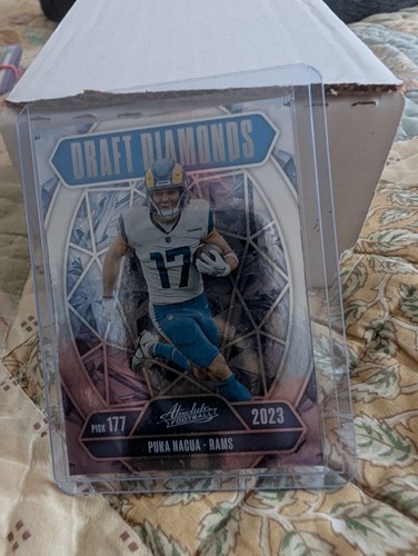Lot puka nacua football - of,