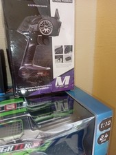 Modélisme RC gros lot de pièces , moteurs , pièces SERVO récepteurs support pile