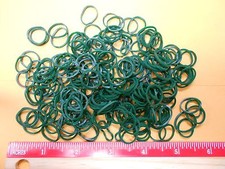 small green  rubber band pony