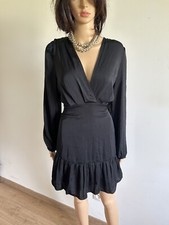 Robe noire neuve à manches