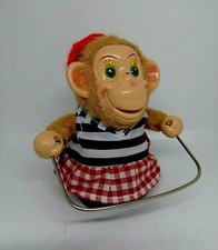 Jouet ancien singe fille corde