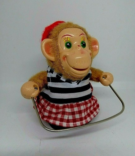 Jouet ancien singe fille corde