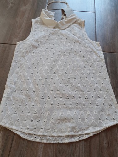 Haut blanc sans - manche, it