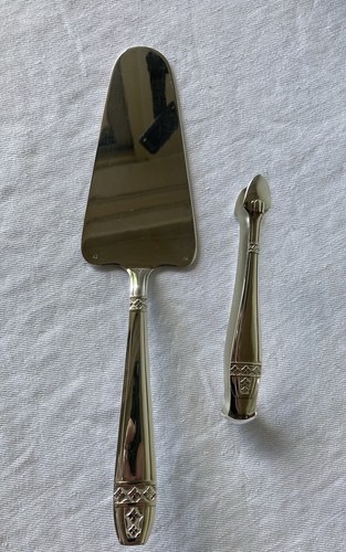 Pelle tarte pince - pelle,