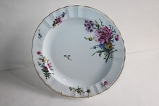 Grand plat rond en porcelaine