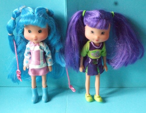 Deux poupées charlotte aux - deux,