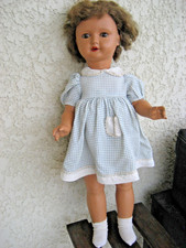 Jolie  poupée BELLA CAPI