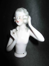 old bust of woman painted